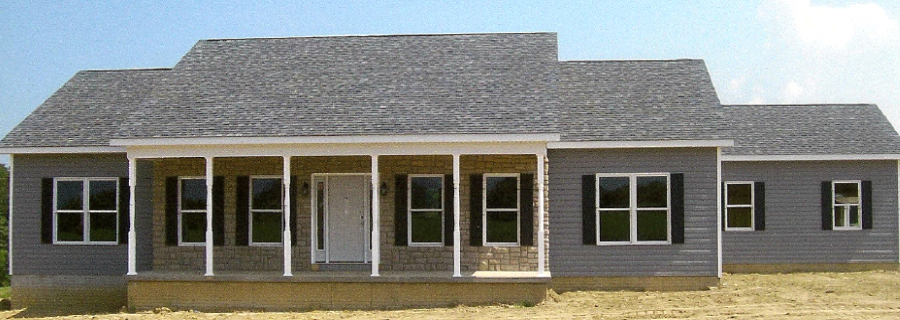 custom home, grey siding with black shutters, open porch area