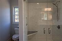 bathroom area, glass seamless showers, tile