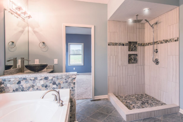 white bathrooom with stone tile